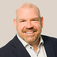 Stephan Gierthmühlen in dunklem Anzug und weißem Hemd, Geschäftsführer und Syndikus Rechtsanwalt beim BDK